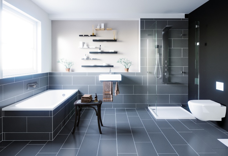 Stylish bathroom showcasing a black tile floor and white walls, found in Annapolis, MD.