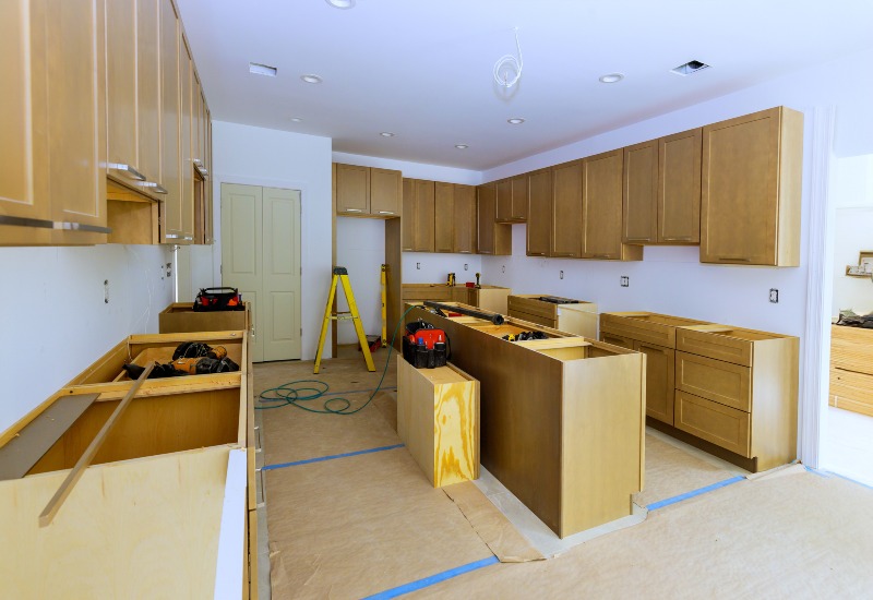 A kitchen under construction, featuring new cabinets and countertops in Annapolis, MD.